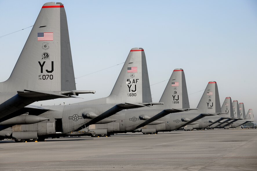 YOKOTA AIR BASE, Japan -- C-130 Hercules aircraft on the flightline here Nov. 4 before launching as part of a seven-ship formation flight. (U.S. Air Force photo/Osakabe Yasuo)