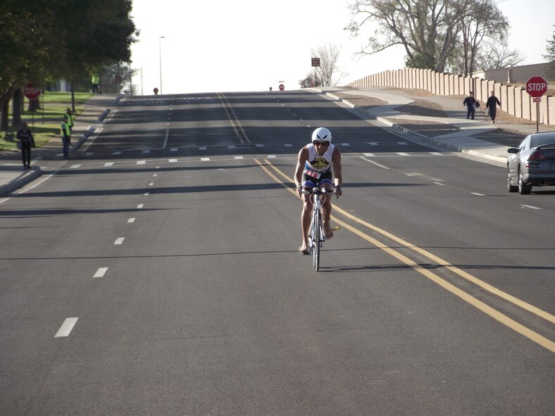 Matthew Gonzales closes in on the finish line during the 12K bike portion of the Wounded Warrior Triathlon.