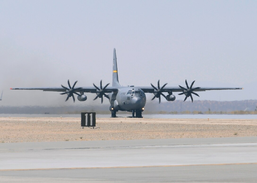A C-130H3 with eight-bladed NP 2000 propellers taxis during a flight test recently at Edward AFB, Calif. The NP 2000 props are designed to provide more thrust and perform more efficiently. (Air Force photo/John Perry)