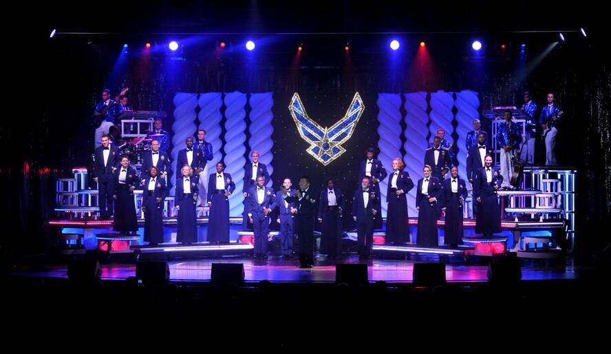 VALDOSTA, Ga. -- Tops In Blue members perform their final set, where they perform in their Mess Dress uniforms as they pay tribute to the men and women of the Air Force. Tops In Blue members travel with semi truck loads full of equipment to help them set up the stage, lights, curtains and whatever else is needed to create a spectacular stage for their performance. (U.S. Air Force photo/Airman 1st Class Joshua Green)(RELEASED)
