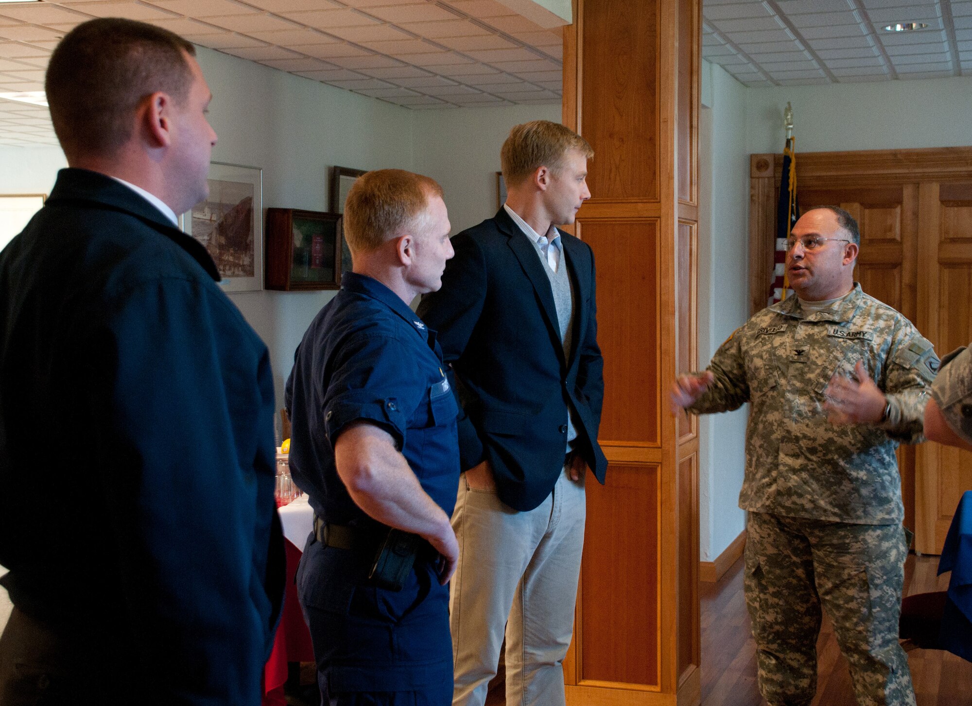 Mr. Charles "Bo" Prosch (third from left), Military Legislative Liaison for Sen. Scott Brown, is greeted at the Massachusetts Military Reservation by Col. Richard Crivello, Camp Edwards commander, Nov. 2, 2010.  Mr. Prosch listened to mission briefings from MMR military commanders and took a windshield tour of the Reservation's facilities.  (U.S. Air Force photo by Master Sgt. Sandra Niedzwiecki)