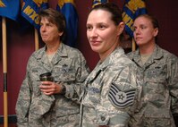Technical Sgt. Alexandra Holstead (foreground), 919th Aircraft Maintenance Squadron, listens during a meeting in which 919th Special Operations Wing leaders surprised her with an immediate promotion under the Promotion Enhancement Program at Duke Field Oct. 2.  The PEP is a commander’s  program designed to promote outstanding and well-deserving Air Force Reserve Airmen one grade above the authorized grade for their position.  Only those Airmen who show outstanding potential are considered based on a demonstrated ability to serve in the next higher grade.  (U.S. Air Force photo/Dan Neely)