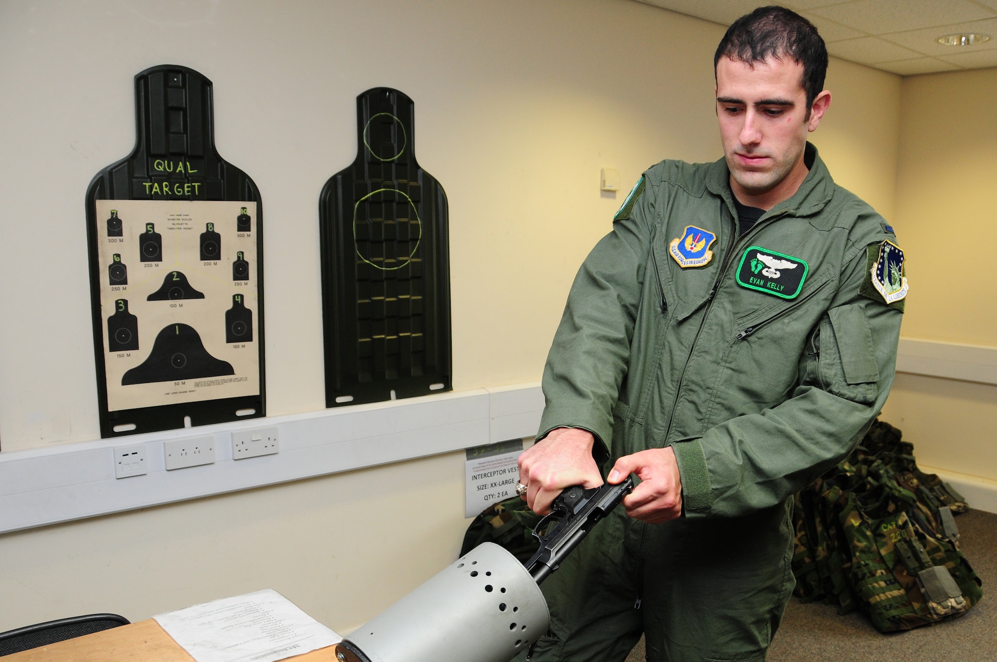 ROYAL AIR FORCE FELTWELL, England – 1st Lt. Evan Kelly, 56th Rescue Squadron HH-60G Pavehawk helicopter pilot, clears his weapon in preparation for the small arms qualification course Nov. 2.  Airmen are required to be weapon certified prior to deployments and permanent changes of stations. (U.S. Air Force photo/Airman 1st Class Erin Zabarnick) 