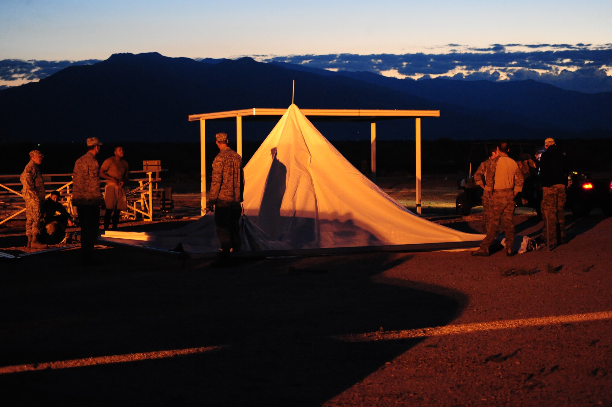 DAVIS-MONTHAN AIR FORCE BASE, Ariz. - Setting up camp and then navigating over rough terrain was just one of the many jobs the Active Duty and Reserve pararescuemen were required to do during a ?Monster Mash? in Tucson Ariz.  The events during the competition consisted of free-fall parachuting, shooting, combat movements, combat medical and navigation. (U.S. Air Force photo/Airman First Class Jerilyn Quintanilla)