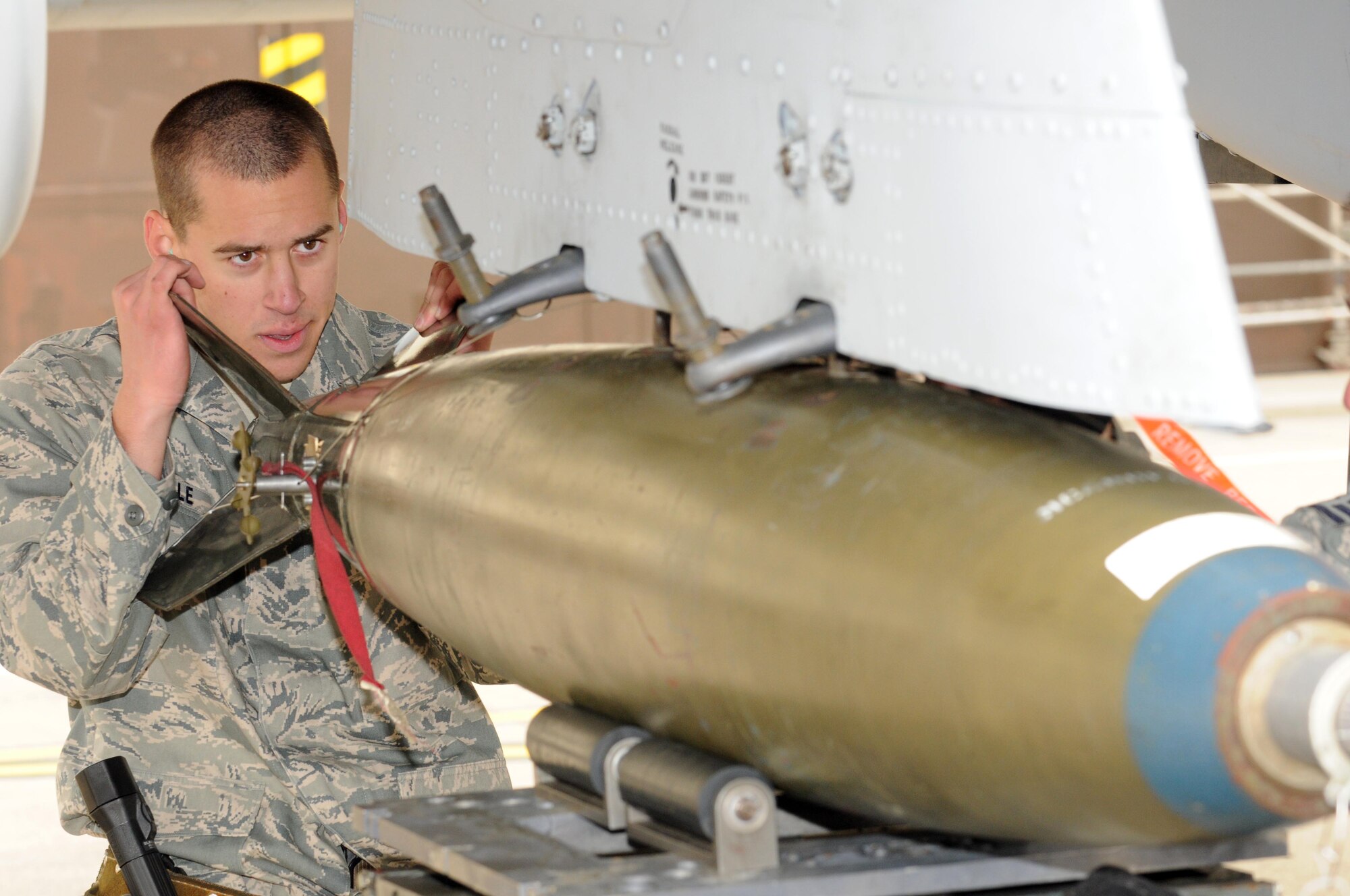 SPANGDAHLEM AIR BASE, Germany –Airman 1st Class Samuel Dipasquale, 52nd Aircraft Maintenance Squadron weapons load crew member, aligns an MK-82 LD bomb to be loaded onto an A-10 Thunderbolt II during the load crew of the quarter competition Nov. 2. The 480th Fighter Squadron load crew competed against the 81st Fighter Squadron load crew to determine the winner that will advance to compete for load crew of the year. (U.S. Air Force photo/Airman 1st Class Matthew B. Fredericks)