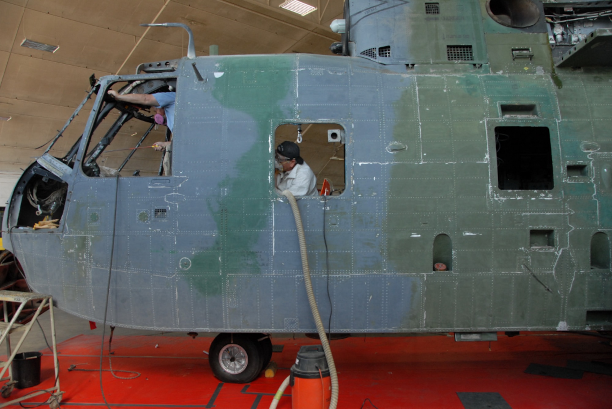 DAYTON, Ohio - Historic HH-3 "Jolly Green" undergoing restoration work at the National Museum of the U.S. Air Force. (U.S. Air Force Photo)