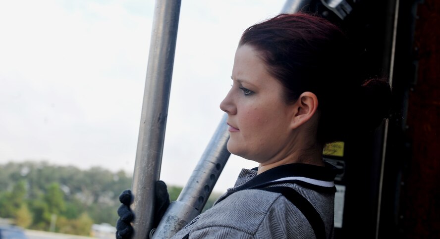 VALDOSTA, Ga. -- Senior Airman Lacy Jones, Tops In Blue vocalist, grabs some stage equipment from the back of a semitruck while helping set the stage up at the Valdosta Performing Arts Center, Nov. 2. Airman Jones is originally from Valdosta and the show was more than a performance; it was a homecoming. (U.S. Air Force photo/Airman 1st Class Joshua Green)
