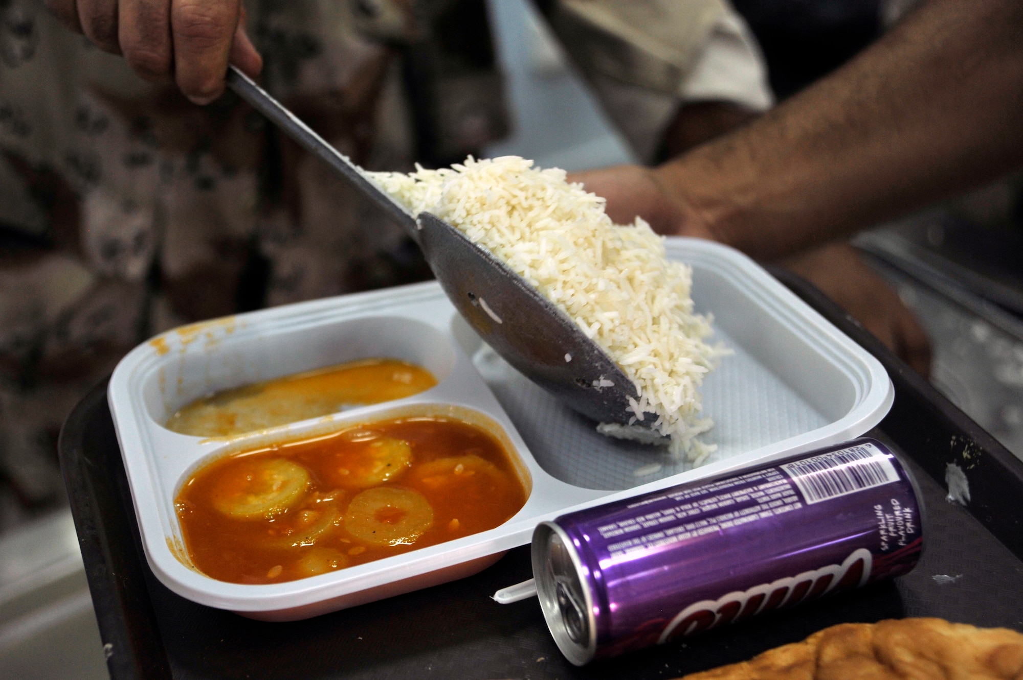 Iraqi Air Force College cadets get lunch at their newly renovated dining facility, Sept. 25, at Tikrit Air Base, Iraq. Cadets at the school are studying to become pilots in the Iraqi air force. Ground support officer training is being held at Taji AB until Tikrit has the infrastructure to support more cadets. The college reopened Sept. 1 when Iraqi air force cadets returned after temporarily operating jointly with the Iraqi army in Ar Rustamiyah since February 2007. (U.S. Air Force photo by Senior Airman Perry Aston) (Released)