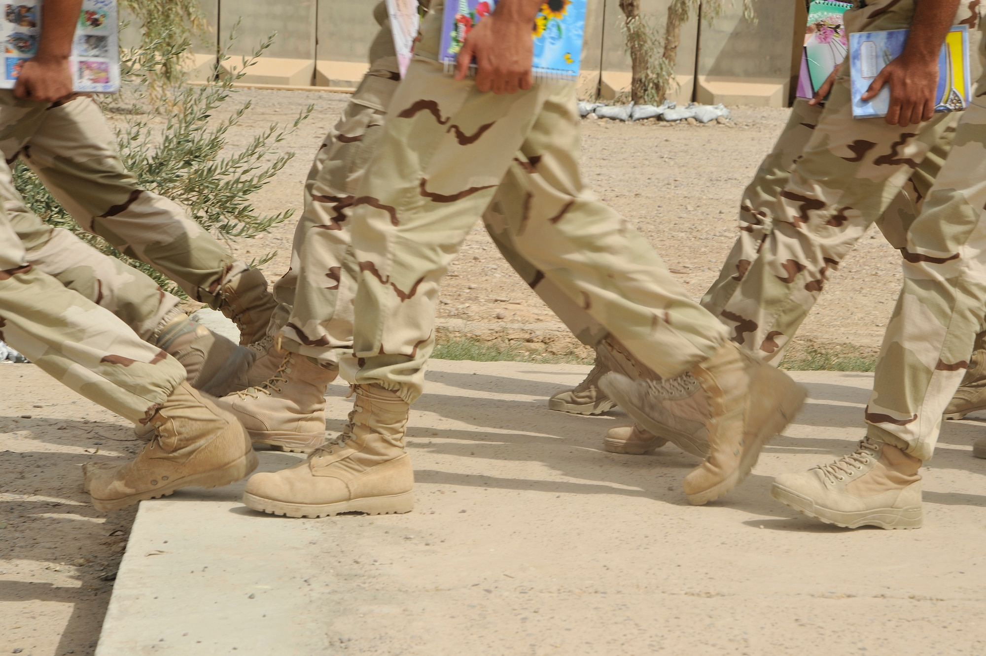 Iraqi Air Force College cadets march to lunch, Sept. 25, cadets are learning subjects like aviation theory, electronic instruments, weather forecasting , English and more at Tikrit Air Base, Iraq. Cadets at the school are studying to become pilots in the Iraqi air force. Ground support officer training is conducted at Taji AB until Tikrit has the infrastructure to support more cadets. The college reopened Sept. 1 when Iraqi air force cadets returned after temporarily operating jointly with the Iraqi army in Ar Rustamiyah since February 2007. (U.S. Air Force photo by Senior Airman Perry Aston) (Released)