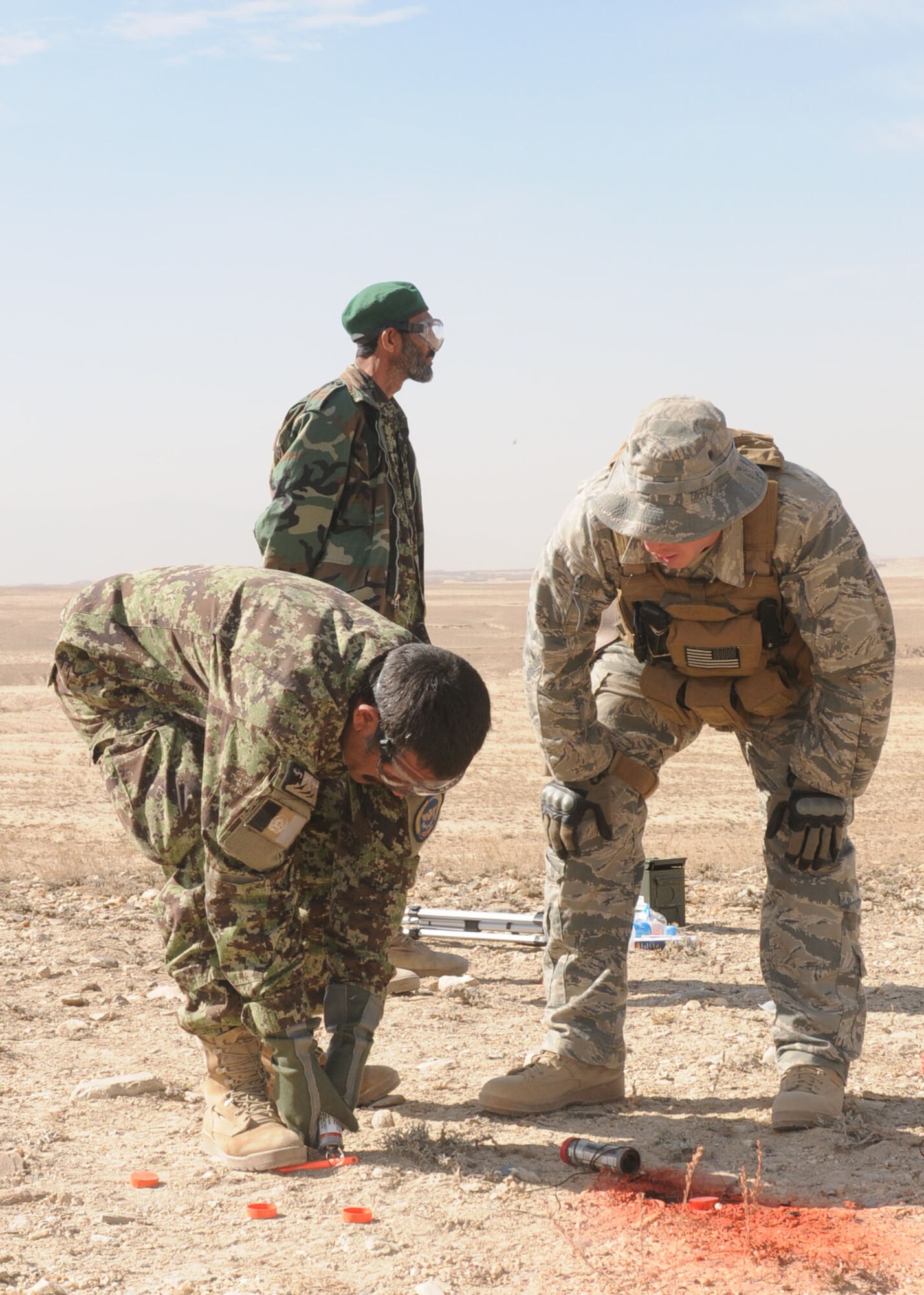 101103-N-6541W-147 KABUL, Afghanistan - Afghan Air Force Life Support Personnel practice using signaling devices. They will begin teaching this life saving skill to Afghan Afghan Air Force pilots so they know how to signal for rescue. (Mass Communication Specialist 3rd Class Jared Walker/ RELEASED).