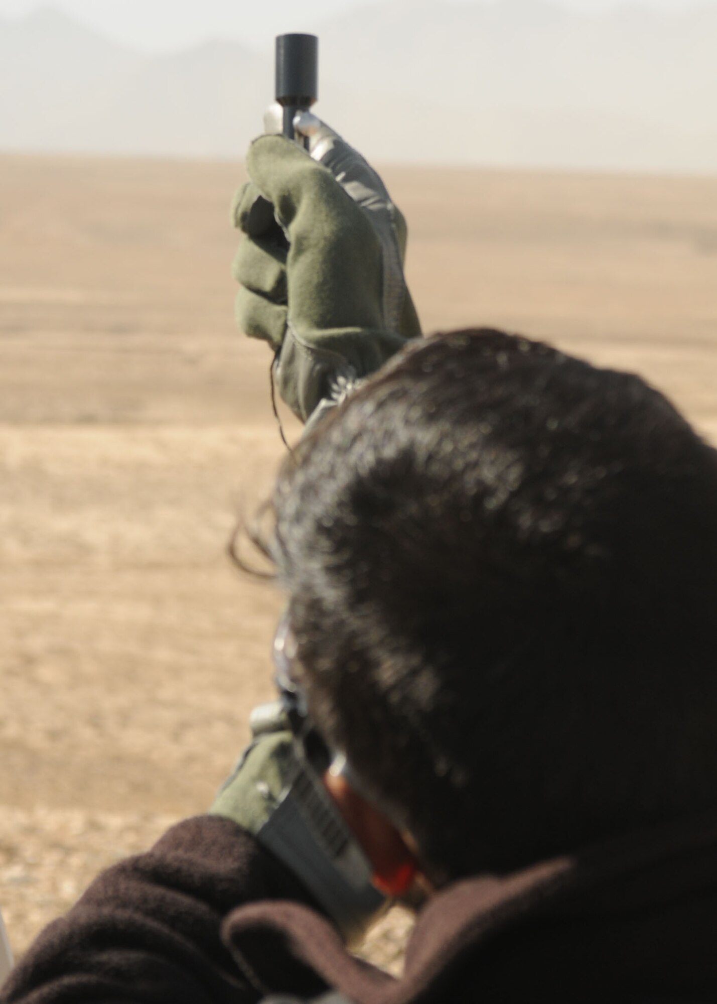 101103-N-6541W-035 KABUL, Afghanistan - Afghan Air Force Life Support Personnel practice using signaling devices. They will begin teaching this life saving skill to Afghan Afghan Air Force pilots so they know how to signal for rescue. (Mass Communication Specialist 3rd Class Jared Walker/ RELEASED).