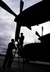 Republic of Korea Air Force aircraft maintainers perform routine maintenance on a ROKAF C-130 aircraft after arriving to Andersen Air Force Base, Guam, Nov. 2. The purpose of the visit was to promote and strengthen the close ties between the allied nations. (U.S. Air Force photo/ Senior Airman Nichelle Anderson/Released)