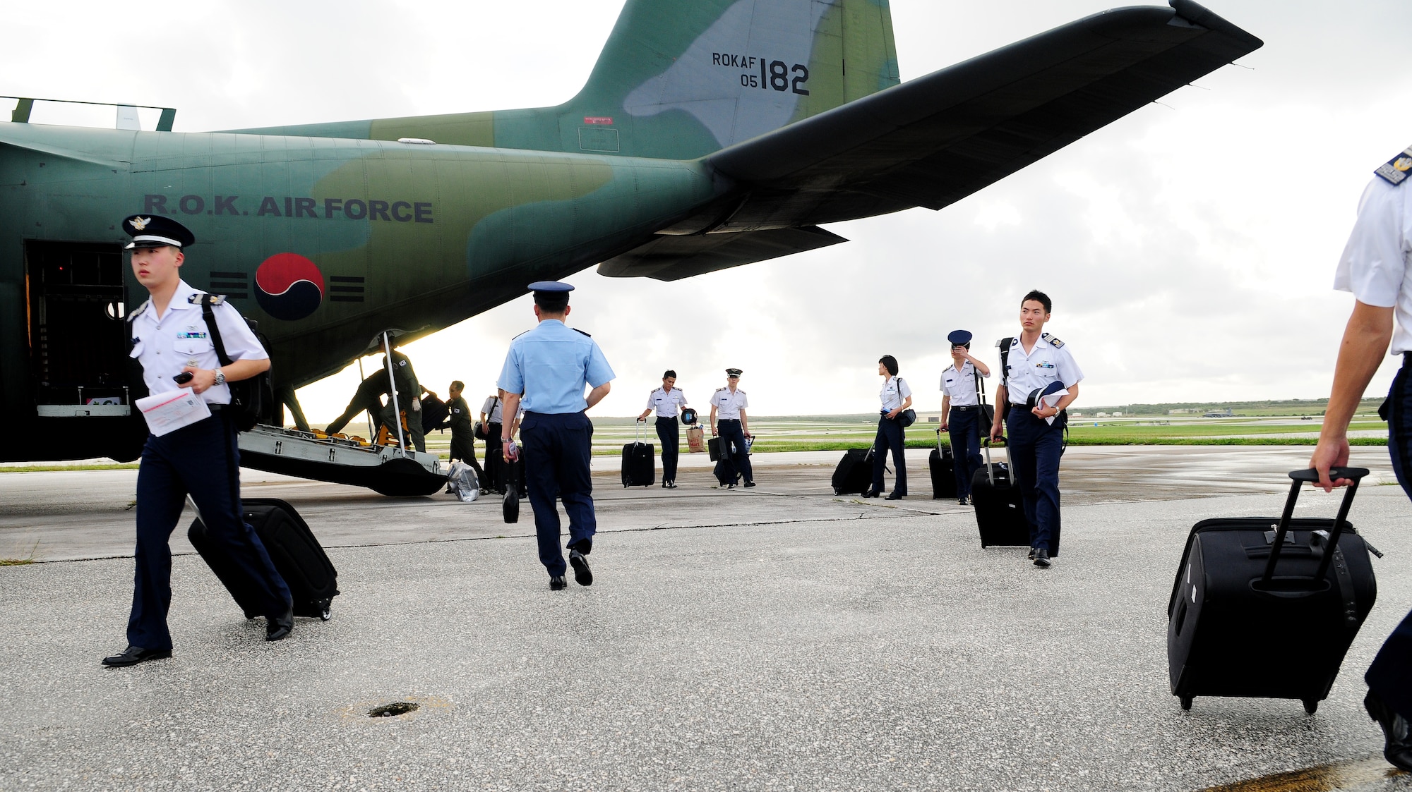 Cadets and officers from the Republic of Korea Air Force arrive at Andersen Air Force Base, Guam, Nov. 2, for a two-day visit here and Naval Base Guam. The purpose of the visit is to promote and strengthen the close ties between the allied nations. While en-route to Andersen AFB the cadets received hands-on training, on the navigation system and techniques of the ROKAF C-130 aircraft. (U.S. Air Force photo/Senior Airman Nichelle Anderson)