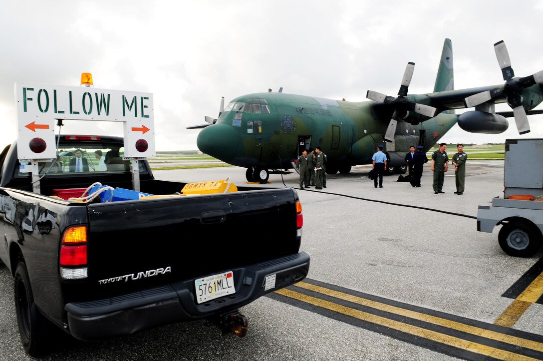 Cadets and officers from the Republic of Korea Air Force arrive at Andersen Air Force Base, Guam, Nov. 2, for a two-day visit here and Naval Base, Guam. The purpose of the visit is to promote and strengthen the close ties between the allied nations. While en-route to Andersen AFB the cadets received hands-on training on the navigation system and techniques of the ROKAF C-130 aircraft. (U.S. Air Force photo/ Senior Airman Nichelle Anderson) 