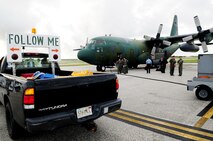 Cadets and officers from the Republic of Korea Air Force arrive at Andersen Air Force Base, Guam, Nov. 2, for a two-day visit here and Naval Base, Guam. The purpose of the visit is to promote and strengthen the close ties between the allied nations. While en-route to Andersen AFB the cadets received hands-on training on the navigation system and techniques of the ROKAF C-130 aircraft. (U.S. Air Force photo/ Senior Airman Nichelle Anderson) 
