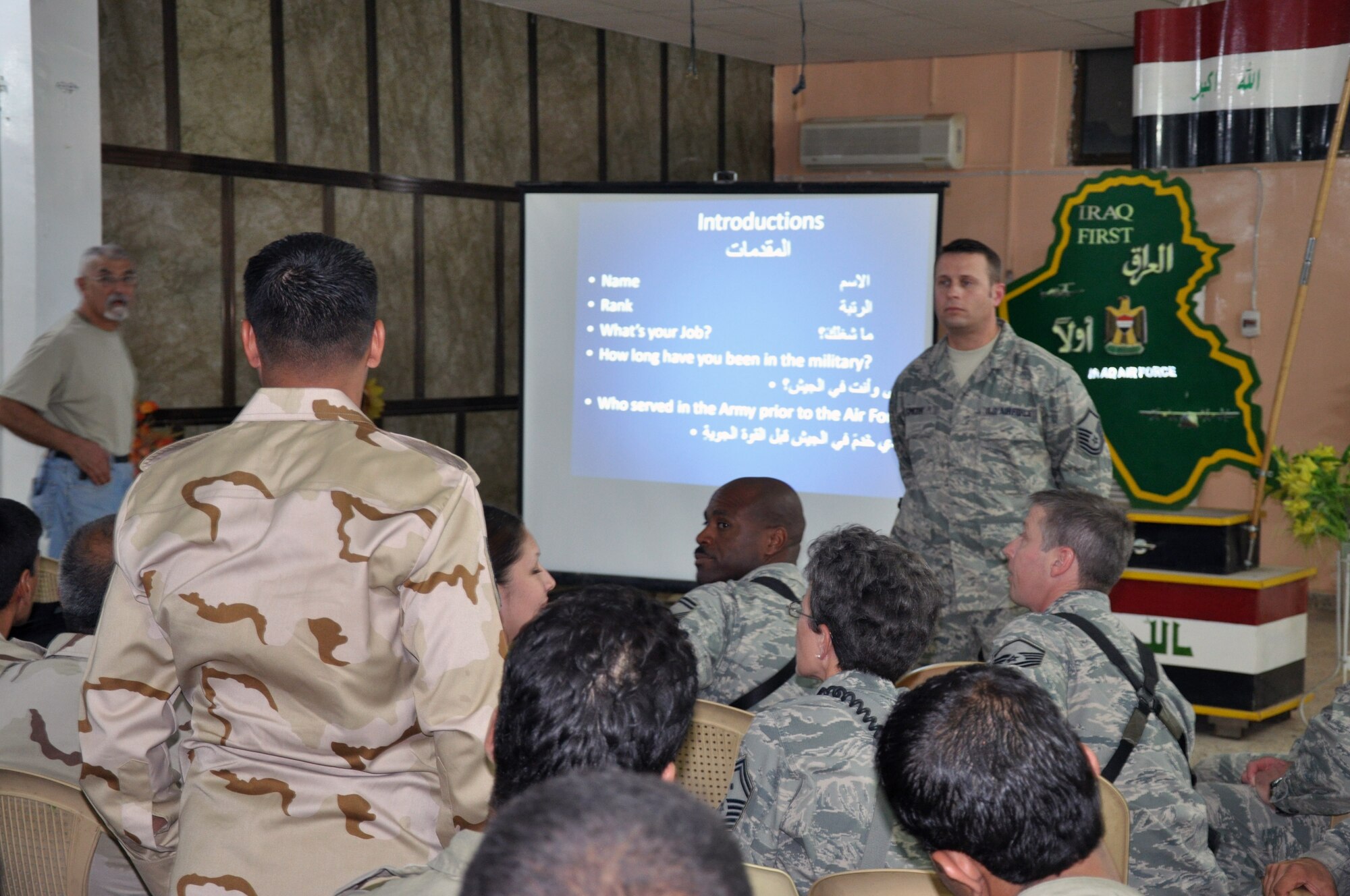 Master Sgt. David Smith, an Air Advisor to the medical community at New Al Muthana Air Base, speaks to a group of enlisted Iraqi Airmen during a non-commissioned officer professional development class.  The class is part of a course on professional development, similar to what U.S. Airmen study.  After this initial class, the plan is to continue working with the Iraqi Air Force and assist them in developing their own enlisted professional development curriculum. (U.S. Air Force photo by Tech. Sgt. Mike Edwards)