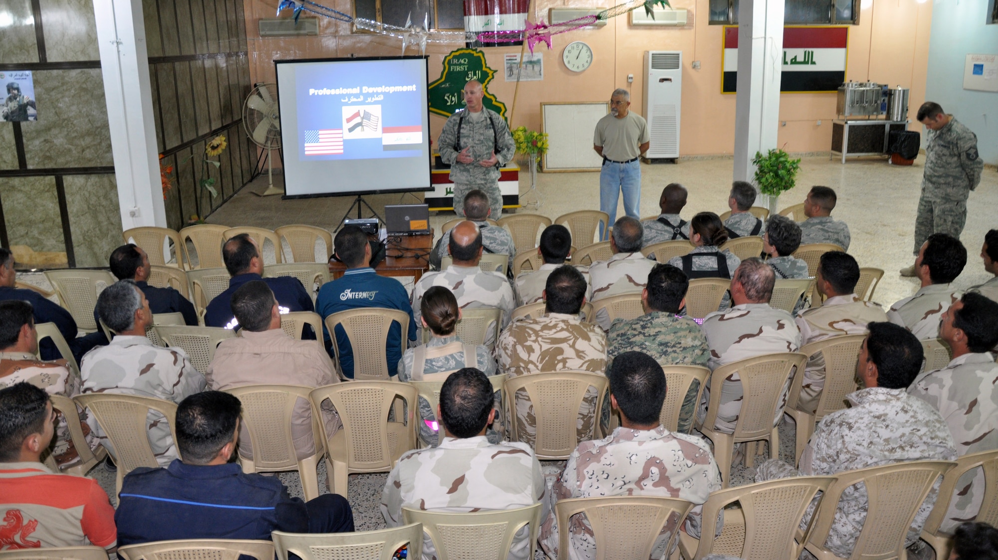 Chief Master Sgt. Scott Fuller, Command Chief for the 321st AEW and ITAM-AF, speaks to a group of enlisted Iraqi Airmen during a non-commissioned officer professional development class.  The class is part of a course on professional development, similar to what U.S. Airmen study.  After this initial class, the plan is to continue working with the Iraqi Air Force and assist them in developing their own enlisted professional development curriculum. (U.S. Air Force photo by Tech. Sgt. Mike Edwards)