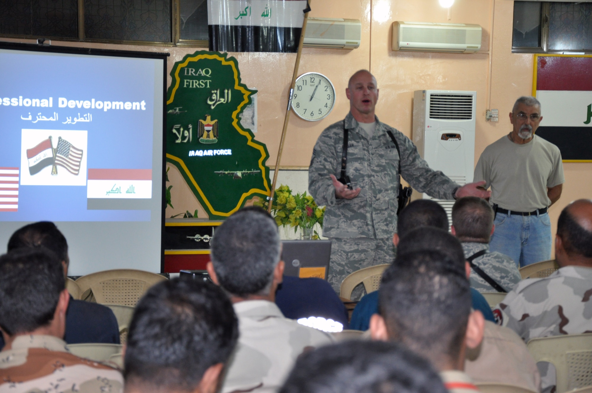 Chief Master Sgt. Scott Fuller, Command Chief for the 321st AEW and ITAM-AF, speaks to a group of enlisted Iraqi Airmen during a non-commissioned officer professional development class.  The class is part of a course on professional development, similar to what U.S. Airmen study.  After this initial class, the plan is to continue working with the Iraqi Air Force and assist them in developing their own enlisted professional development curriculum. (U.S. Air Force photo by Tech. Sgt. Mike Edwards)
