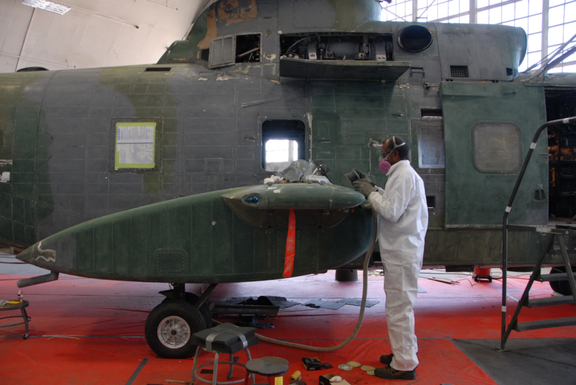 DAYTON, Ohio - Historic HH-3 "Jolly Green" undergoing restoration work at the National Museum of the U.S. Air Force. (U.S. Air Force Photo)