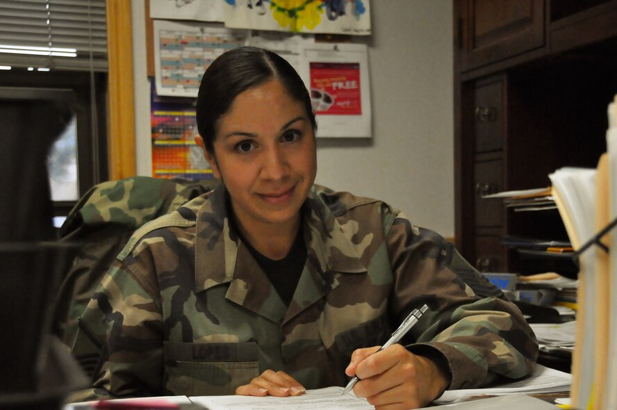 Master Sgt. Teresa Lopes of the 419th Force Support Squadron Command Support Staff, hard at work on the endless stream of high profile paperwork that flows to her desk. (U.S. Air Force photo/Staff Sgt. Alan Schultz)
