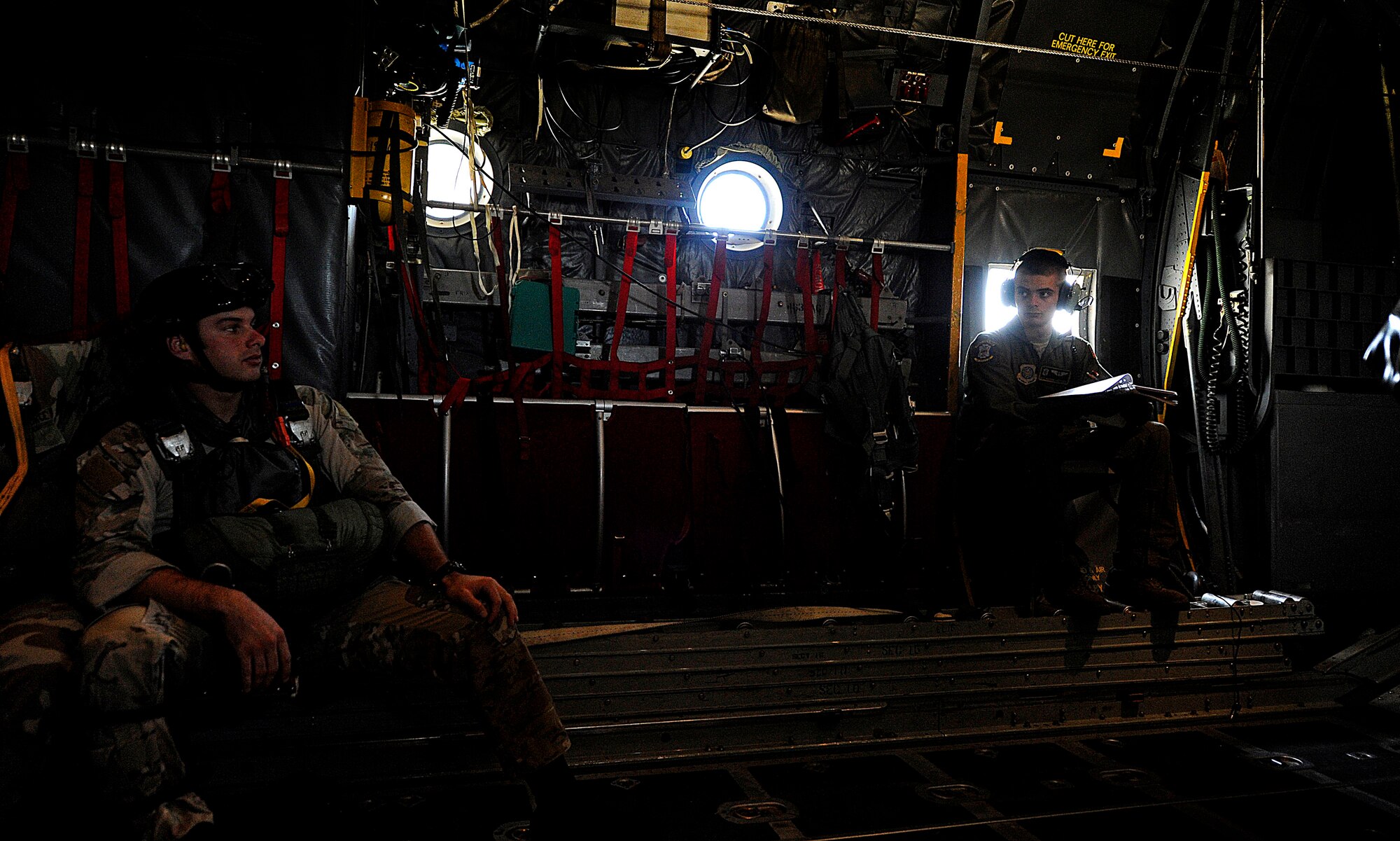 U.S. Air Force members from the 23rd Special Tactics Squadron, Air Force Special Operations Command, Hurlburt Field, Fla., wait to jump out of the back of a C-130 Hercules Sept. 27, 2010. The airmen will practice combat operations in the Santa Rosa Sound. (U.S. Air Force Photo by Master Sgt. Russell E Cooley IV/Released)