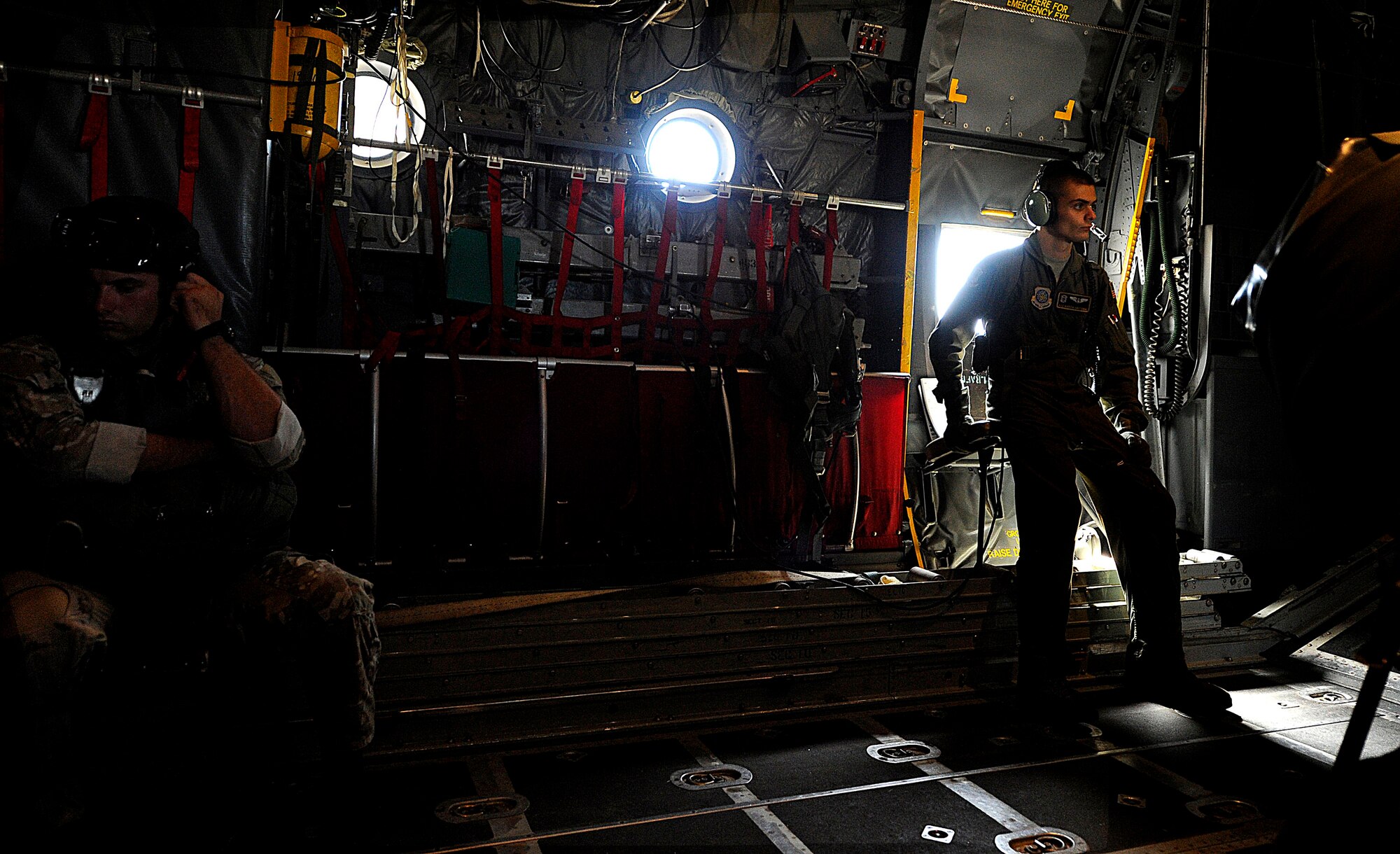 U.S. Air Force members from the 23rd Special Tactics Squadron, Air Force Special Operations Command, Hurlburt Field, Fla., wait to jump out of the back of a C-130 Hercules Sept. 27, 2010. The airmen will practice combat operations in the Santa Rosa Sound. (U.S. Air Force Photo by Master Sgt. Russell E Cooley IV/Released)