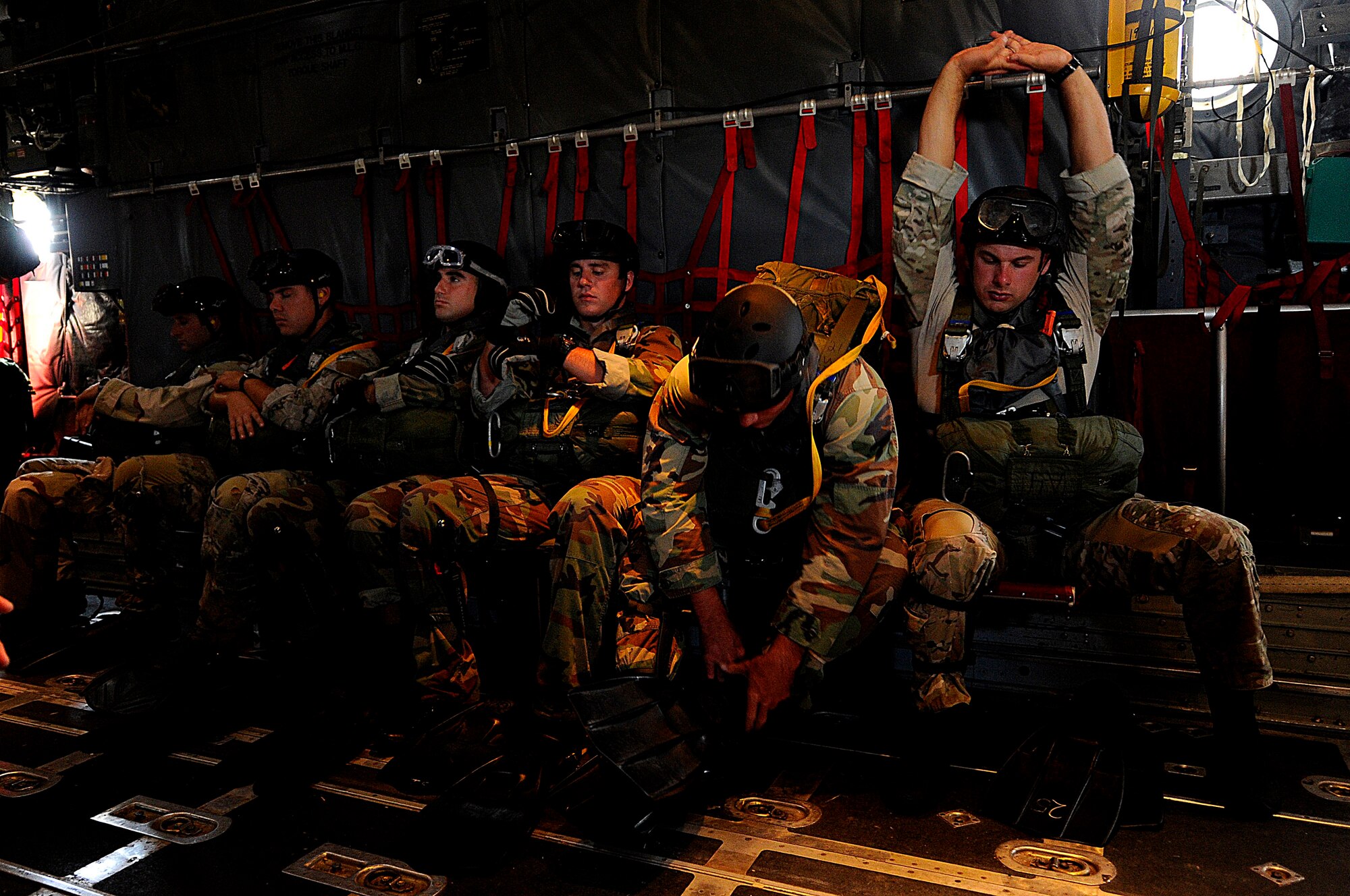 U.S. Air Force members from the 23rd Special Tactics Squadron, Air Force Special Operations Command, Hurlburt Field, Fla., wait to jump out of the back of a C-130 Hercules Sept. 27, 2010. The airmen will practice combat operations in the Santa Rosa Sound. (U.S. Air Force Photo by Master Sgt. Russell E Cooley IV/Released)