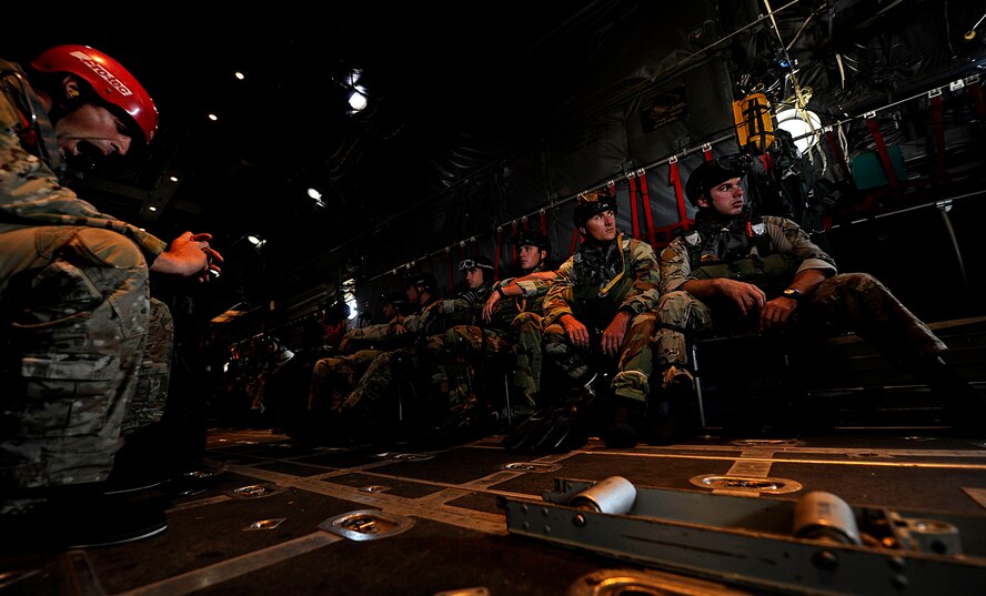 U.S. Air Force members from the 23rd Special Tactics Squadron, Air Force Special Operations Command, Hurlburt Field, Fla., wait to jump out of the back of a C-130 Hercules Sept. 27, 2010. The airmen will practice combat operations in the Santa Rosa Sound. (U.S. Air Force Photo by Master Sgt. Russell E Cooley IV/Released)