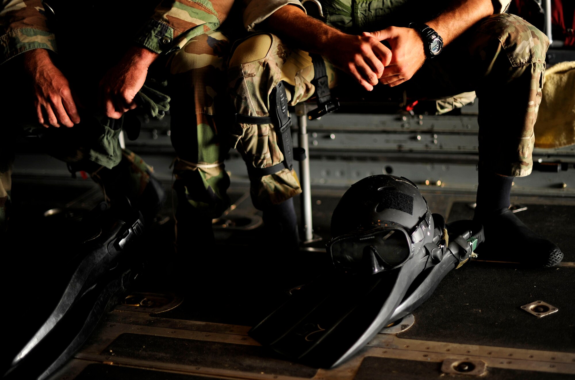 U.S. Air Force members from the 23rd Special Tactics Squadron, Air Force Special Operations Command, Hurlburt Field, Fla., wait to jump out of the back of a C-130 Hercules Sept. 27, 2010. The airmen will practice combat operations in the Santa Rosa Sound. (U.S. Air Force Photo by Master Sgt. Russell E Cooley IV/Released)