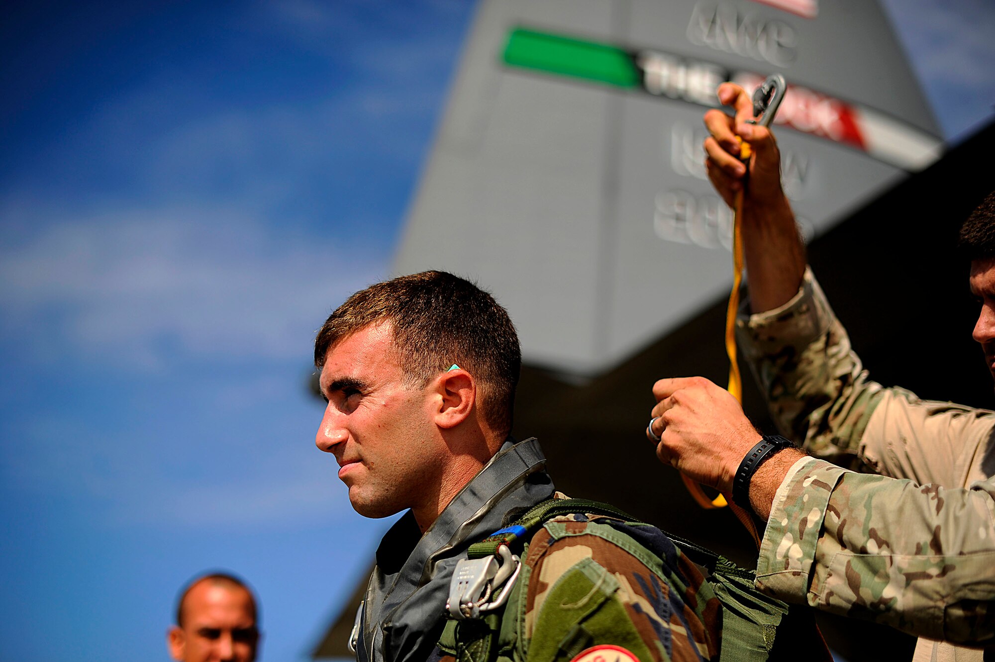 U.S. Air Force members from the 23rd Special Tactics Squadron, Air Force Special Operations Command, inspect each other's parachute rigging at Hurlburt Field, Fla., Sept. 27, 2010. The airmen will practice combat operations in the Santa Rosa Sound. (U.S. Air Force Photo by Master Sgt. Russell E Cooley IV/Released)