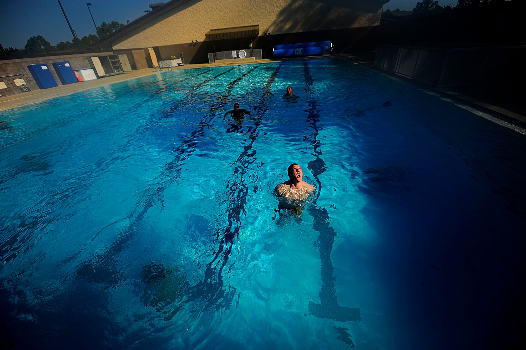 A U.S. Air Force member from the Special Tactics Training Squadron, Air Force Special Operations Command, Hurlburt Field, Fla., comes up for air while participating in pre-scuba training Sept. 21, 2010. (U.S. Air Force Photo by Master Sgt. Russell E Cooley IV/Released)