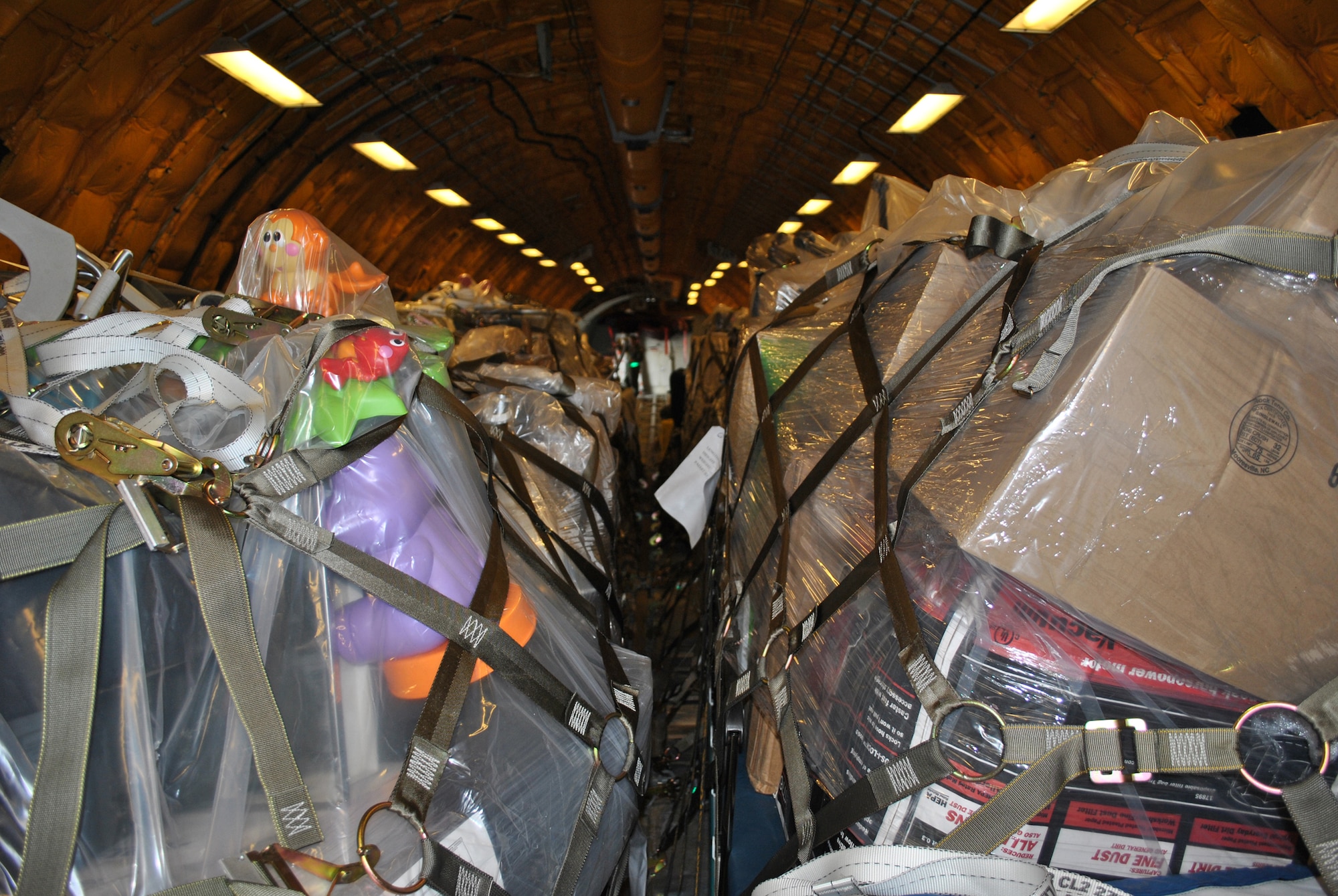 SOTO CANO AIR BASE, Honduras --  Two KC-10 Extenders from Joint Base McGuire-Dix-Lakehurst, N.J., delivered 18 tons of humanitarian supplies here Oct. 21 and 25. The delivery was part of the Denton Program, which allows the Department of Defense to use extra space on U.S. military cargo aircraft to transport humanitarian assistance materials. (Photo by Staff Sgt. Andrew De La Torre)