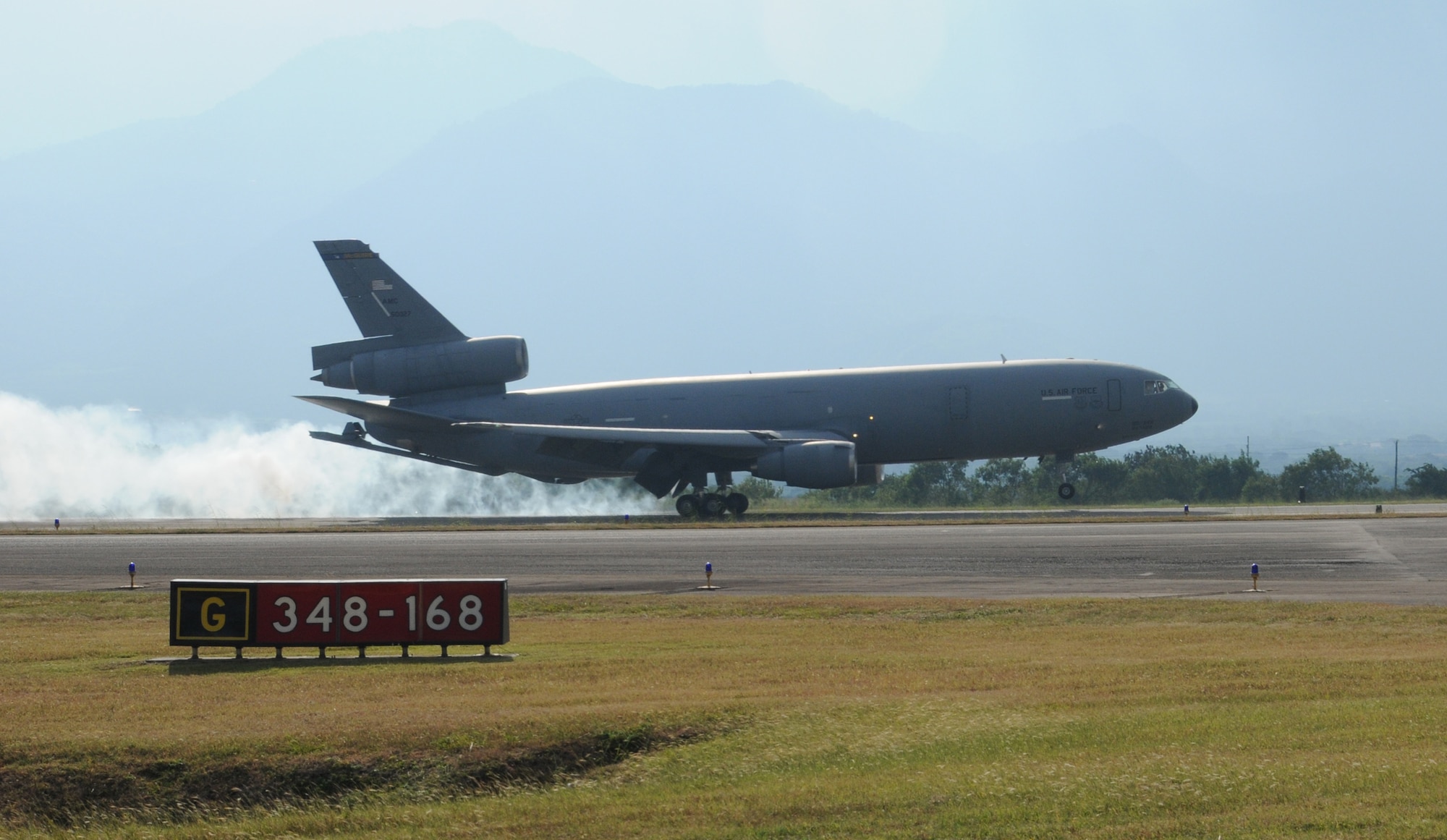 SOTO CANO AIR BASE, Honduras --  A KC-10 Extender from Joint Base McGuire-Dix-Lakehurst, N.J., lands on the flightline here Oct. 21. The aircraft was one of two from Joint Base MDL that delivered 18 tons of humanitarian supplies for local charities. (U.S. Air Force photo/Tech. Sgt. Benjamin Rojek)