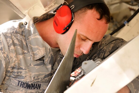 Staff Sgt. Brandon Trowman from the 90th Aircraft Maintenance Unit, loads an AIM-9 onto an F-22 Thursday.  Members from the 90th AMU, 90th Fighter Squadron, and the 302nd Fighter Squadron deployed to Tyndall AFB, Fla. to take part in the Weapons Systems Evaluation Program.  During this three-week deployment, pilots and maintainers are working together to validate the air-to-air combat capability of the newest F-22 Raptors in the Air Force inventory.  WSEP’s full mission includes loading missiles, flying with and firing missiles and hitting targets.  (U.S. Air Force photo/Technical Sgt. John Hoffman)