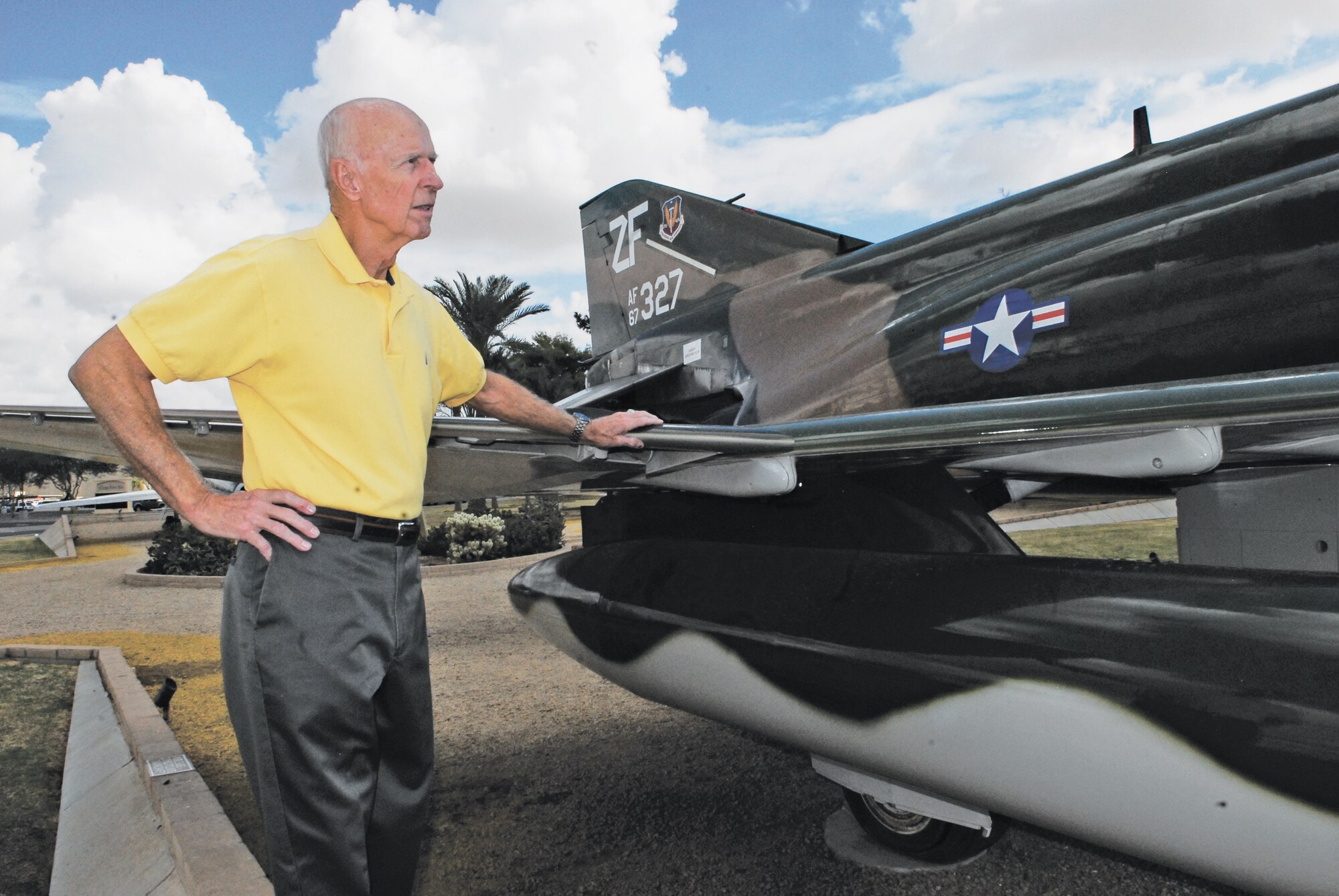 Retired Maj. Gen. Hank Canterbury, former 832nd Air Division commander assigned to Luke, remembers his time on active duty.  General Canterbury piloted an F-4E Phantom II during Operation Linebacker II at the end of the Vietnam War.  His name is one of three Airmen on the airplane memorialized in the Luke air park.  (U.S. Air Force photo/Senior Master Sgt. Larry Schneck)