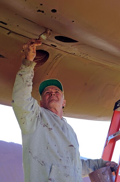 Gene Smith paints a primer coat on a B-52D at the Eighth Air Force Museum, Barksdale Air Force Base, La., Nov. 4. The B-52D is going through restoration including a paint and sheet metal replacement. The historic B-52D at Barksdale completed more than 400 missions in the Vetenam War and was flown during Operation Linebacker II. (U.S. Air Force photo/Staff Sgt. John Gordinier)