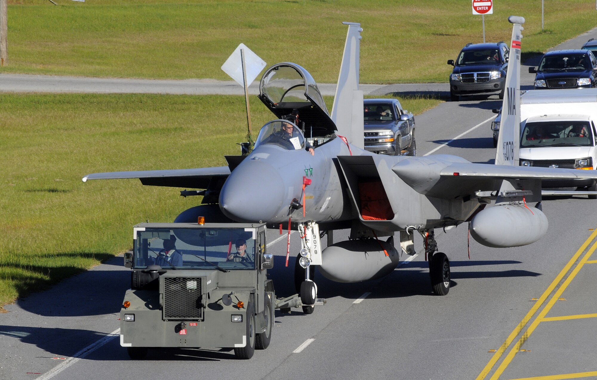 An F-15C fighter aircraft credited with two aerial victories over Iraq during Operation Desert Storm was towed down GA Highway 247 to the Museum of Aviation on Friday. On February 6, 1991, Captain Thomas Dietz shot down two Russian-built MiG 21s over Iraq using AIM-9 missiles.  The aircraft (F-15C #79-078) was assigned to the 36th Tactical Fighter Wing, Bitburg AB, Germany at the time flying missions from a base in Saudi Arabia. F-15s are credited with downing 37 aircraft during aerial engagements over Iraq during the first three months of 1991. 
The F-15 will be used to support hands-on training of 402nd Maintenance Wings civilian aircraft maintenance technicians assigned to Robins Air Force Base.  The F-15 and a C-130 already in place will allow maintenance training to take place on aircraft located at the Museum.  According to a statement from the 402nd Maintenance Wing, “Journeyman mechanics will be able to utilize this trainer to perform the hands-on task requirements on flight controls, electronic, mechanical, fuel and engine systems.  The trainer will also be used to provide a systems familiarization to our entry-level helper trainees when they are first hired. By utilizing this trainer, we will be able to provide quality training with an aircraft available at all times and not affect the production schedule of the 402 Maintenance Wing."
"The move went well" according to Wilbert Boyd, 561st AMXS/MXDPD, who was the tow chief. "A perfect move, he added."  U. S. Air Force photo by Sue Sapp 