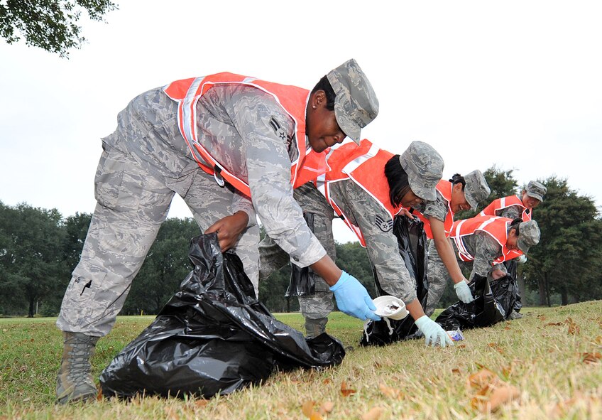 Members of the 78th Medical Group collect trash Oct. 27 as part of the base-wide cleanup. U. S. Air Force photo by Tommie Horton