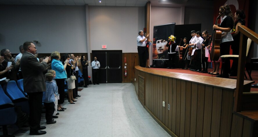 Cello and Violin students from the Cukurova University State Conservatory performed in the “Children of the Republic Concert” to celebrate Turkey’s 87th Republic Day, Oct. 25, 2010 at the base theater on Incirlik Air Base, Turkey Brig. Gen. Haluk Selvi, the commander of the 10th Tanker Command hosted the event, which was open to all Airmen as a sign of U.S. and Turkey’s continued partnership. (U.S. Air Force photo/Senior Airman Sara Csurilla/Released)