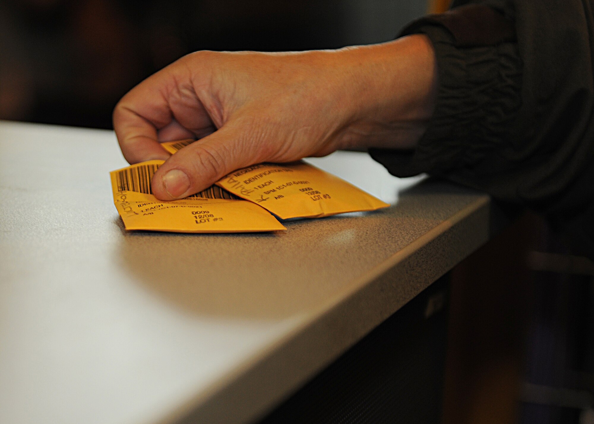 RAF MILDENHALL, England -- Base and honorary commanders go through a mock deployment line during the Honorary Commanders' Deployment Day here Nov. 4, 2010.  The events of the day allowed the honorary commanders to catch a glimpse of what servicemembers experience when they deploy.  (U.S. Air Force photo/Senior Airman Tabitha M. Lee)  