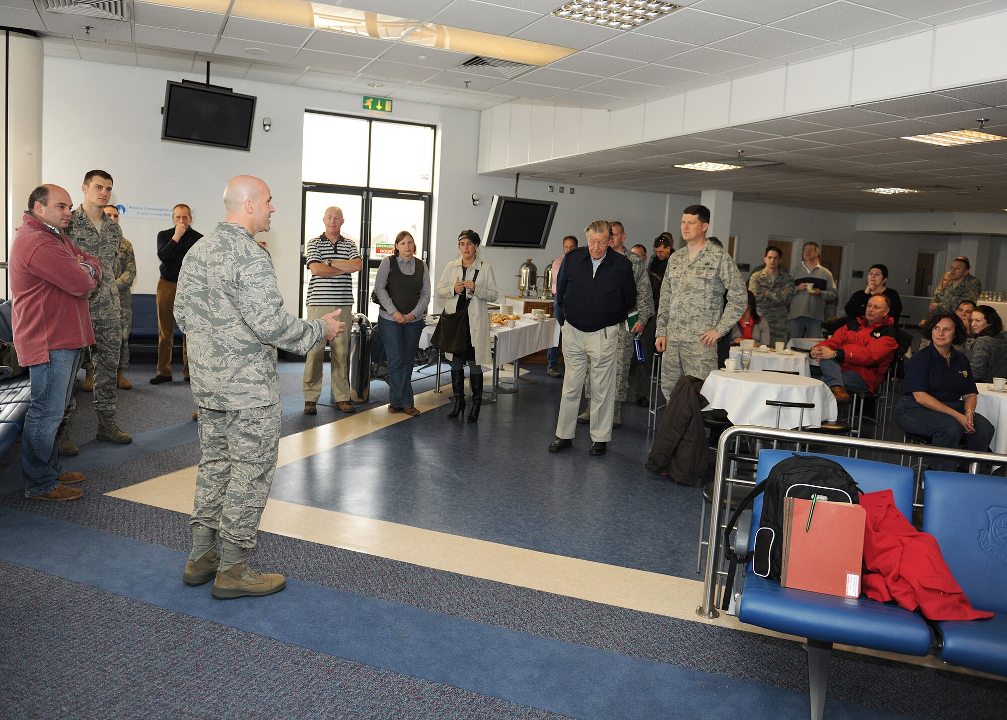RAF MILDENHALL, England -- Col. Chad Manske, 100th Air Refueling Wing commander, welcomes honorary commanders during the Honorary Commanders' Deployment Day here Nov. 4, 2010.  The honorary commander program gives base commanders and local community leaders opportunities to build partnerships.  (U.S. Air Force photo/Senior Airman Tabitha M. Lee)  