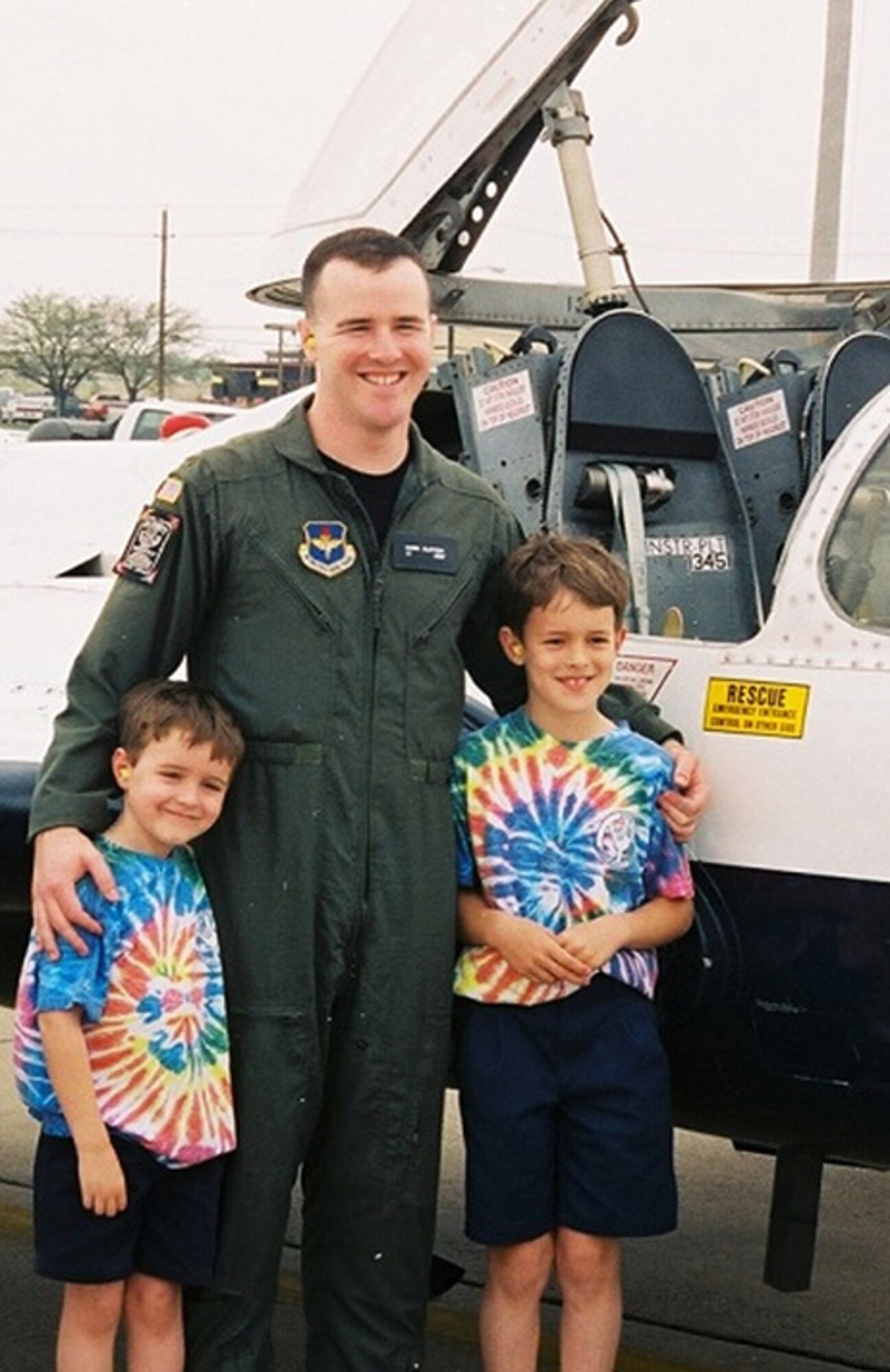 Capt. Chris Slattery poses for a photo with his two brothers in a photo taken before the accident. (Courtesy photo)