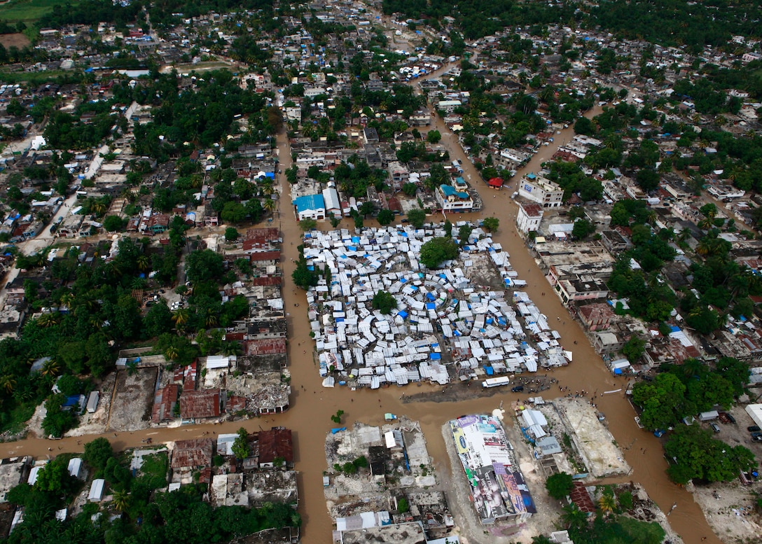 An urbanized area is seen by U.S. Marines and Sailors outside Port-Au-Prince, Haiti, Nov. 6, 2010, while gathering an understanding of the destruction caused by hurricane Tomas. If tasked, the amphibious assault ship USS Iwo Jima will ensure safety and effectively conduct humanitarian relief operations so that lives are saved and near-term suffering is minimized in support of the government of Haiti, MINUSTAH and USAID.