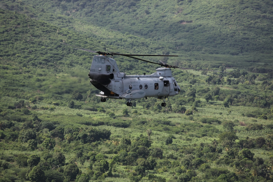 A CH-46E Sea Knight helicopter with Marine Medium Helicopter Squadron 774 assesses the aftermath of Hurricane Tomas off the southern claw of Haiti, Nov. 6, 2010, in preparation for tentative disaster relief efforts to the region in support of the government of Haiti, MINUSTAH and USAID. Marines and sailors embarked aboard USS Iwo Jima attached to Special-Purpose Marine Air-Ground Task Force concluded humanitarian operations in Paramaribo, Suriname, Nov. 1, 2010, for Haiti relief efforts.