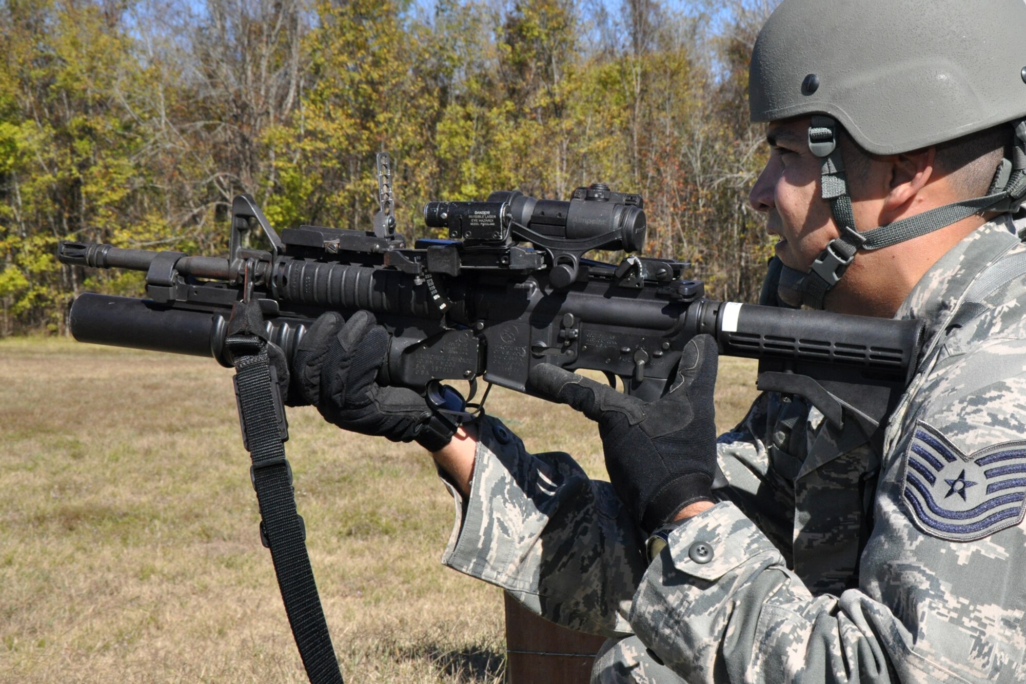 Technical Sergeant Daniel Zamora, 917th Security Forces Squadron, waits for the his 40mm round training round to hit the target at the 203 Range on Barksdale Air Force Base, La., Nov. 4, 2010. Sergeant Zamora was taking the time to get a little practice in with the M203 Grenade Launcher. The M203 Grenade Launcher is a lightweight, single-shot, breech-loaded 40mm weapon designed especially for attachment to the M4 Carbine and the M16A2/A4 Rifle. It creates a versatile combination weapon system capable of firing both 5.56mm rifle ammunition as well as the complete range of 40mm high explosive and special purpose ammunition. Sergeant Zamora is part of the 917th SFS team that will compete in the first-ever Global Strike Challenge, which concludes Nov. 16 – 17 in the Bossier Shreveport area. (U.S. Air Force photo/Tech. Sgt. Jeff Walston)
