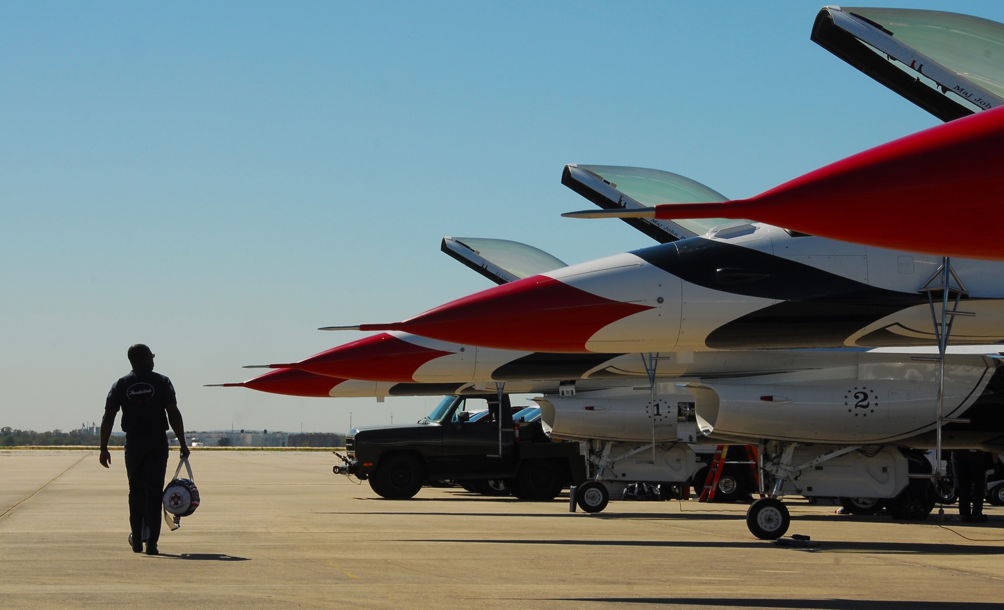 Air Force Thunderbird maintainers finish pre-inspections on the air demonstration team's F-16 Fighting Falcons Nov. 5, 2010, at Lackland Air Force Base, Texas. The Thunderbirds performed an air show Nov. 6 and 7 at Lackland AFB's AirFest 2010. (U.S. Air Force photo/Staff Sgt. Jamie Powell)