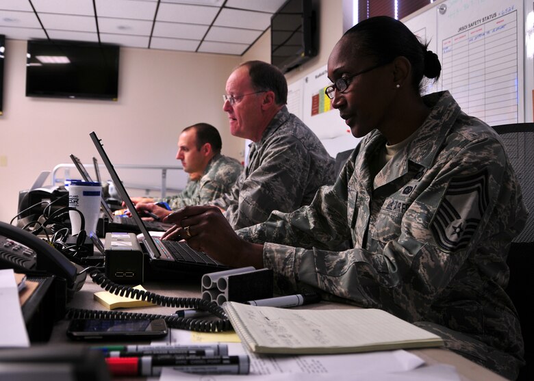 Chief Master Sgt. Phyllis Aubrey (right), 175th Force Support Squadron, Maryland Air National Guard, supports the Emergency Management Center/Mayor’s Cell during Exercise Vigilant Guard at Warfield Air National Guard Base, Baltimore, Md., Nov. 6, 2010, along with (right to left) Lt. Col. William Hensel and 1st Lt. Paul Huettner. Exercise Vigilant Guard involved more than 2,000 personnel from units in Maryland, Delaware, Pennsylvania, the District of Columbia, and West Virginia. (U.S. Air Force photo by Staff Sgt. Benjamin Hughes/Released) 