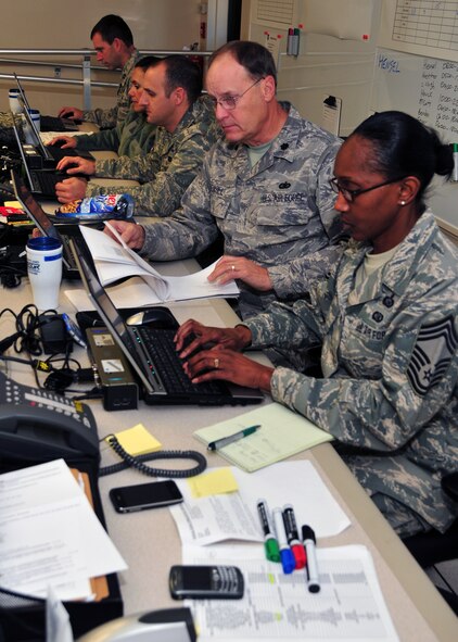 Chief Master Sgt. Phyllis Aubrey (right), 175th Force Support Squadron, Maryland Air National Guard, supports the Emergency Management Center/Mayor’s Cell during Exercise Vigilant Guard at Warfield Air National Guard Base, Baltimore, Md., Nov. 6, 2010 along with (right to left) Lt. Col. William Hensel, 1st Lt. Paul Huettner, Master Sgt. Natalie Bakhsh, and Capt. Michael McCarty. Exercise Vigilant Guard involved more than 2,000 personnel from units in Maryland, Delaware, Pennsylvania, the District of Columbia, and West Virginia. (U.S. Air Force photo by Staff Sgt. Benjamin Hughes/Released) 