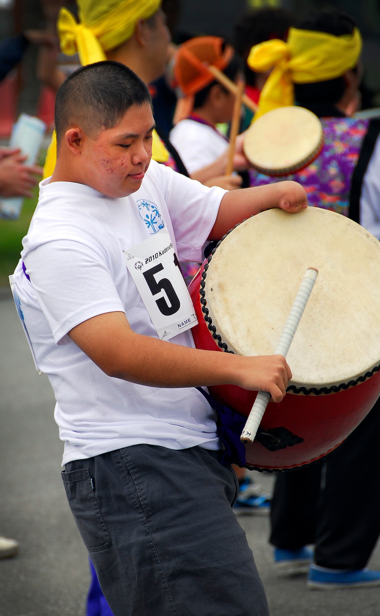 Tsuyoshi Urasaki, a special athlete this year at the Kadena Special Olympic Games, plays the drums during an Eisa performance for the athletes. More than 830 special athletes competed at the games this year with the help of more than 2,500 volunteers. (U.S. Air Force photo/ Airman 1st Class Maeson L. Elleman)