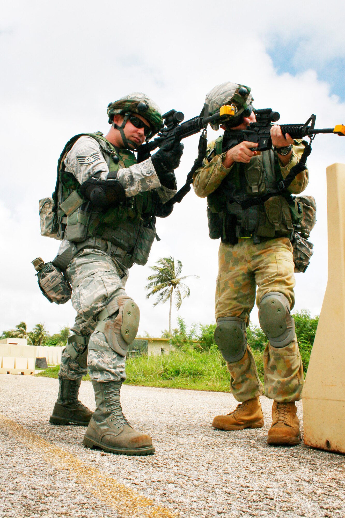 Staff Sgt. David Burrus, 644th Combat Communications Squadron, teamed up with LAC Matthew Brougham of the Royal Australian Air Force 1st Combat Communications Squadron during a 20-day Combat Readiness School (CRS) course here recently where students learned how to properly secure and defend the Forward Operating Base (FOB) from opposing forces.  (Photo by Sara Mortimer)